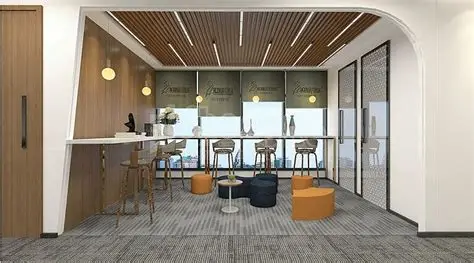 厦门九州星域科技有限公司办公环境,现代化办公室内景,员工正在工作,蓝色背景,明亮自然光